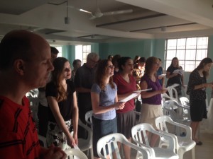The team worshipping together Sunday evening